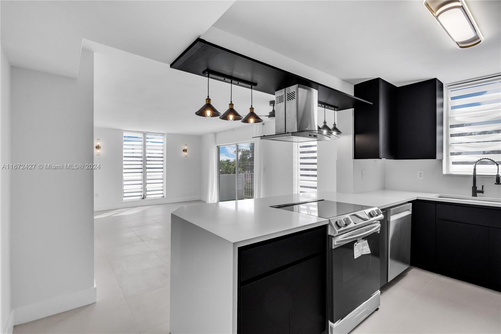 Stunning 4-bed, 2-bath condo in the heart of NoBe, Miami Beach’s upcoming area! Fully renovated with a designer kitchen and all-new appliances, including a dishwasher. The beautifully renovated bathrooms and sleek porcelain tile floors add a touch of elegance. Enjoy the spacious, sun-filled rooms, plus a brand-new washer/dryer for added convenience. Step out onto the balcony to relax and unwind. Just steps from the beach and the newly revamped North Beach Park. Includes one covered parking spot. Nestled in a peaceful neighborhood with easy access to dining, shopping, and entertainment. Extremely low HOA fees of only $325 per month make this gem even more appealing. Perfect for beach lovers and families looking for the best of Miami Beach living. Don’t miss out on this prime location gem!