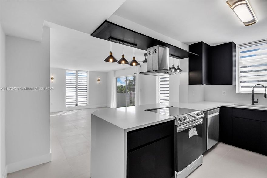 Stunning 4-bed, 2-bath condo in the heart of NoBe, Miami Beach’s upcoming area! Fully renovated with a designer kitchen and all-new appliances, including a dishwasher. The beautifully renovated bathrooms and sleek porcelain tile floors add a touch of elegance. Enjoy the spacious, sun-filled rooms, plus a brand-new washer/dryer for added convenience. Step out onto the balcony to relax and unwind. Just steps from the beach and the newly revamped North Beach Park. Includes one covered parking spot. Nestled in a peaceful neighborhood with easy access to dining, shopping, and entertainment. Extremely low HOA fees of only $325 per month make this gem even more appealing. Perfect for beach lovers and families looking for the best of Miami Beach living. Don’t miss out on this prime location gem!