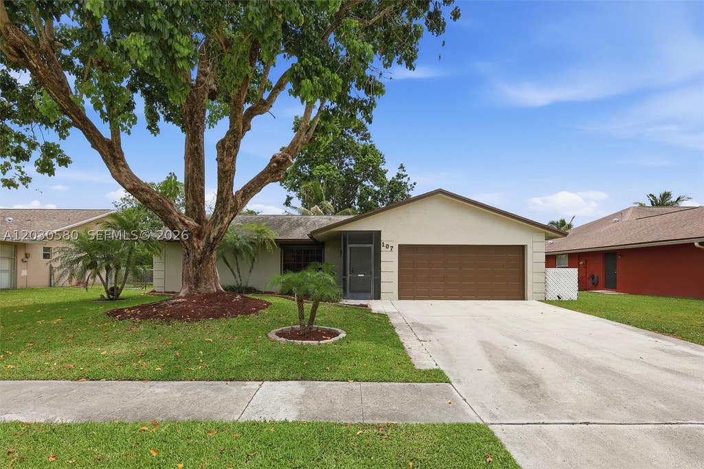 Photo of 107 Starling Ave, Royal Palm Beach, FL 33411 (MLS # A12030580)