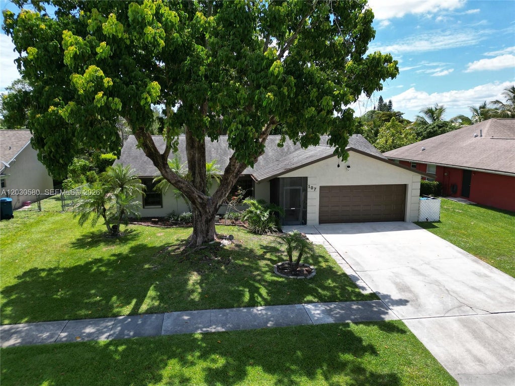 Photo of 107 Starling Ave, Royal Palm Beach, FL 33411 (MLS # A12030580)