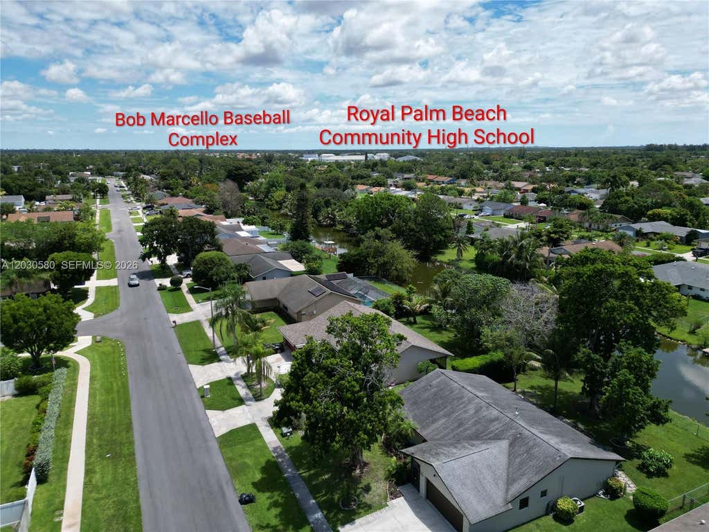 Photo of 107 Starling Ave, Royal Palm Beach, FL 33411 (MLS # A12030580)