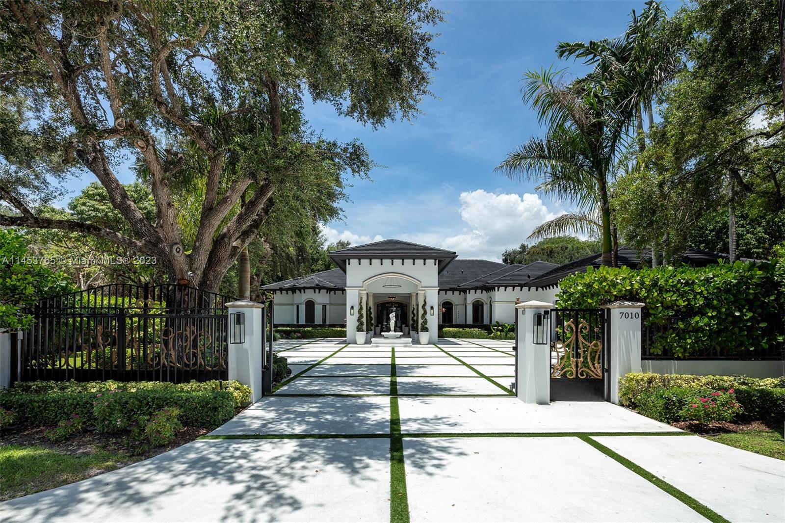 Now accepting backup offers. Introducing Fountain Manor, an Exquisite, recently built, fully furnished & gated Mediterranean gem in the heart of S. Miami, featuring a detached guesthouse overlooking the resort-style backyard built for relaxation & entertainment. Newly updated turnkey home radiates luxury w/ high-end finishes, extensive upgrades, designer furnishings & verdant landscaping. Eye-catching design & materials at every turn. Elegant entrance foyer & great room overlook the shimmering pool & manicured putting green. Open floor plan chef's kitchen w/ custom stonework opens to expansive family room & breakfast nook. Large primary suite w/ dual his & her mahogany walk-in closets. Add'l Gym, wine cellar, & laundry. Heated saltwater pool + spa, outdoor kitchen, putting green.