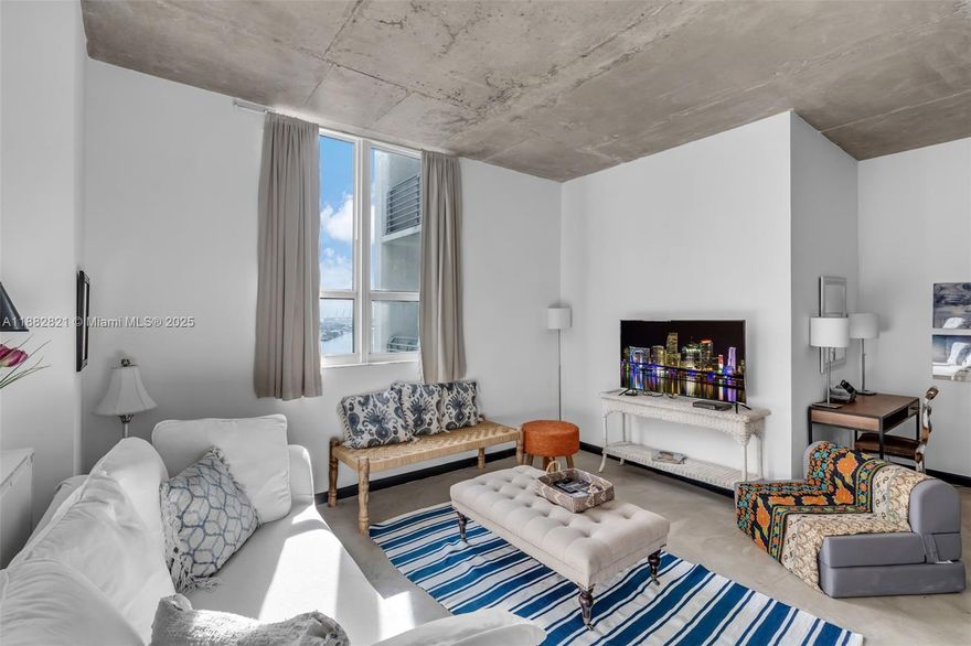 Located on the 21st floor, this light-filled residence offers three unobstructed view lines of Biscayne Bay, unaffected by the Waldorf Astoria development. This unit offers a unique blend of vibrant city energy and peaceful waterfront scenery. Located just steps from the Miami World Center — the “Little Manhattan” of Miami — this residence is also ideal for investors and seasonal residents. Amenities include a steam room, sauna, fitness center, pool, lounge and game room for private gathers with friends and family.The building allows flexible leasing with a 30-day minimum, making it an excellent income-generating opportunity. Furniture is available for separate purchase, offering a turnkey option for immediate occupancy or rental. Easy to show!