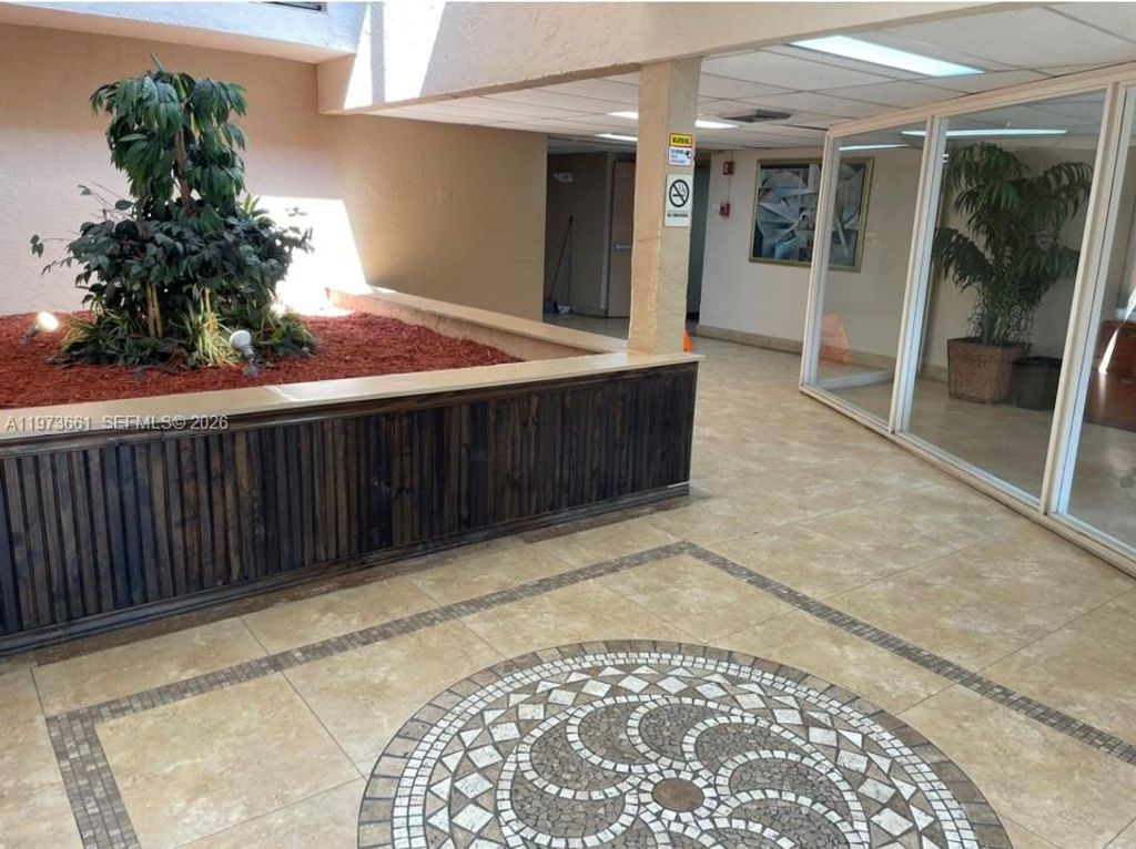 Photo of 10001 W Atlantic Blvd #122, Coral Springs, FL 33071 (MLS # A11973661)