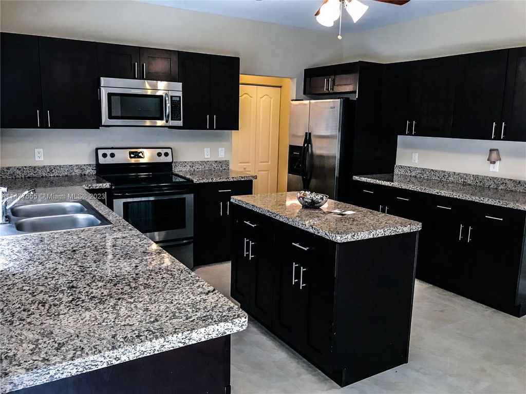 Photo of 3568 Sanctuary Dr, Coral Springs, FL 33065 (MLS # A11477555)