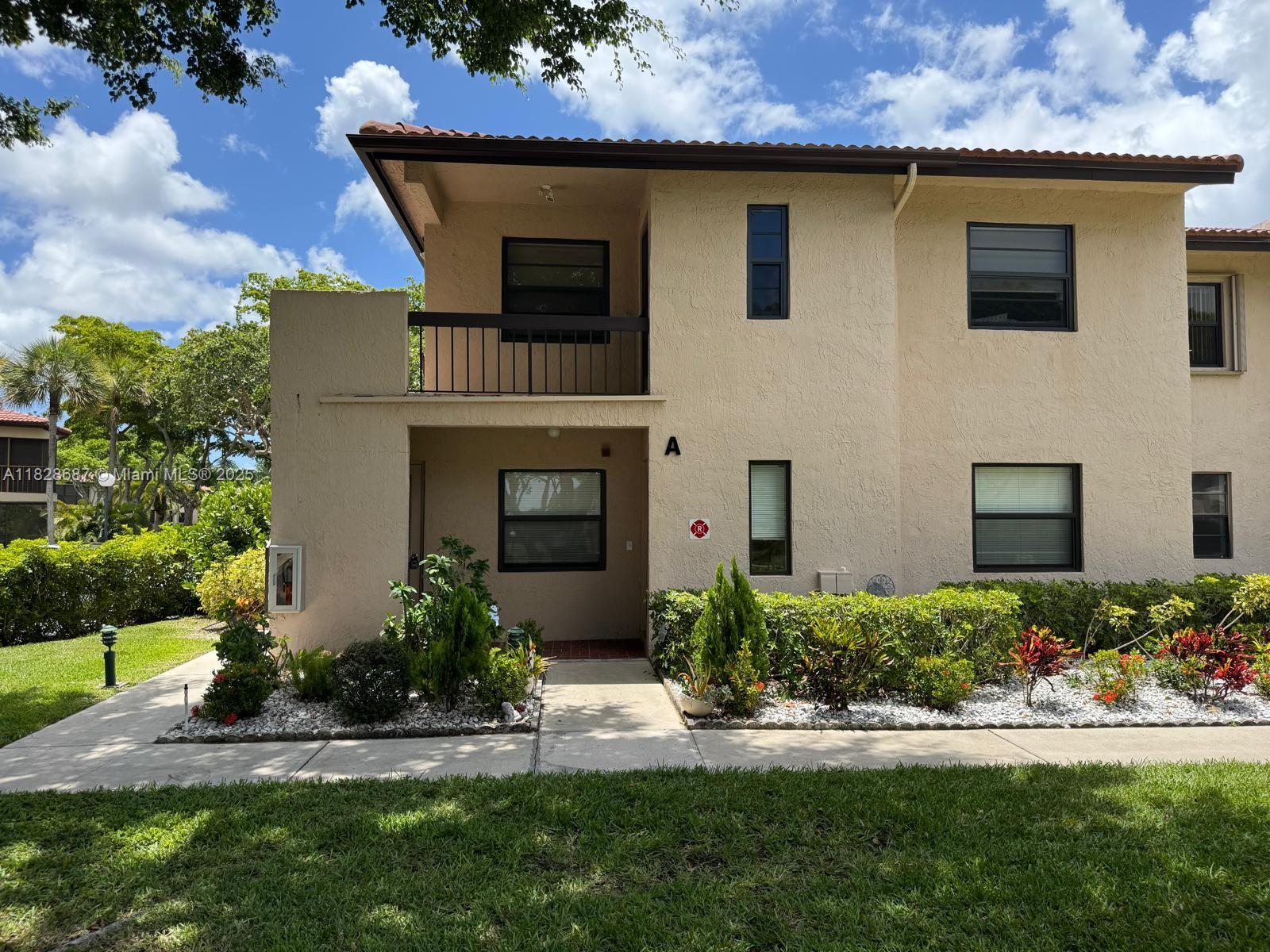 Beautiful 1st floor end unit with stunning lake views in the desirable Pines of Boca Lago. This bright 2 beds, 2 baths home features an enclosed sunroom with floor-to-ceiling windows, a spaicous eat-in kitchen with granite countertops and stainless steel applicanes, and a large living/dining area that opens to a private patio. The primary suie includes three closets (one walk-in) and a renovated en-suite bath with doubles vanity. The second bedroom is near a stylish updated guest bath. Enjoy washer and dryer inside the unit. Gated 55+ community.