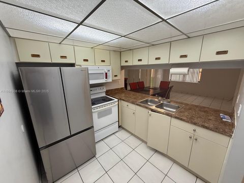 Photo of 6395 W 27th Ct #102, Hialeah, FL 33016 (MLS # A11864308) Photo of 6395 W 27th Ct #102, Hialeah, FL 33016 (MLS # A11864308)