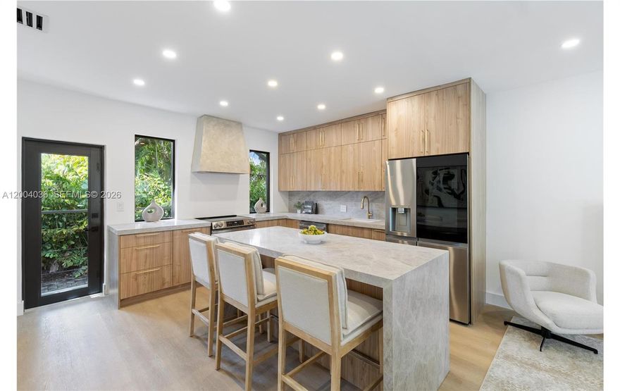 Experience modern living in the heart of Miami’s MiMo District & Morningside. Just steps from the waterfront, Be the first to live in this newly updated 3 bedroom, 2 bathroom home featuring a bright open layout, wide-plank flooring, custom kitchen with full-height wood cabinetry, Taj Mahal quartz countertops, a waterfall island, venetian plaster and sleek contemporary finishes.
The exterior offers a large paver driveway with wide side access to the backyard ideal for multiple vehicles or boat storage. Fresh tropical landscaping enhances the setting, all on a 5,850 SF lot with room to create a private outdoor retreat.
Located just off Biscayne Blvd, surrounded by some of Miami’s best restaurants, bars, and cafés, and minutes from the Design District, Wynwood, and Miami Beach. Offering a vibrant, connected lifestyle.