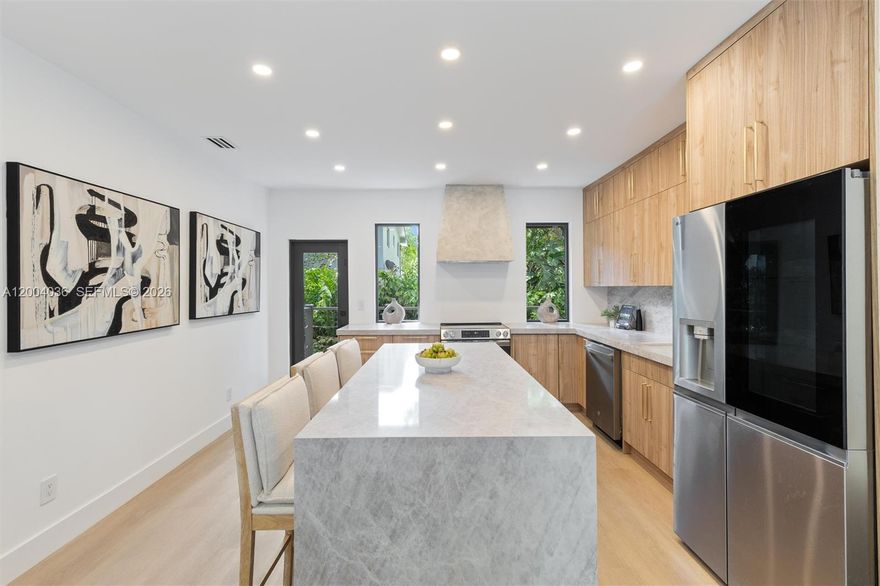 Experience modern living in the heart of Miami’s MiMo District & Morningside. Just steps from the water access to nearby islands. Be the first to live in this newly updated 3 bedroom, 2 bathroom home featuring a bright open layout, wide-plank flooring, custom kitchen with full-height wood cabinetry, Taj Mahal quartz countertops, a waterfall island, venetian plaster and sleek contemporary finishes.
The exterior offers a large paver driveway with wide side access to the backyard ideal for multiple vehicles or boat storage. Fresh tropical landscaping enhances the setting, all on a 5,850 SF lot with room to create a private outdoor retreat.
Prime Location in Biscayne Blvd, surrounded by some of Miami’s best restaurants, bars, cafés, and minutes from the Design District, Wynwood, and Miami Beach. Offering a vibrant, connected lifestyle.