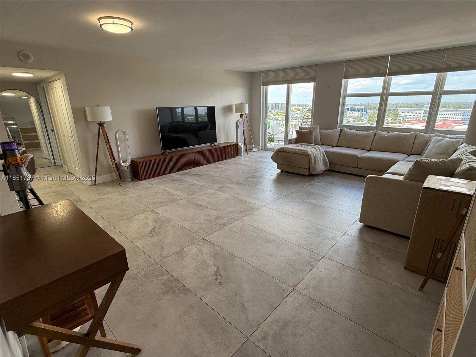 NEW ON THE MARKET, completely renovated with top-of-the-line appliance. Two bedrooms, two bathrooms, and brand new windows. This corner unit offers a spectacular view of the bay and city. The HOA includes cable, high-speed internet, and TV. The building features a brand-new gym, a large swimming pool, and a sauna, as well as very comfortable library. The unit came with and assigned parking space and there is also guest parking and storages unit. The area is unbeatable, with all the most important shops near by and close to the beach.