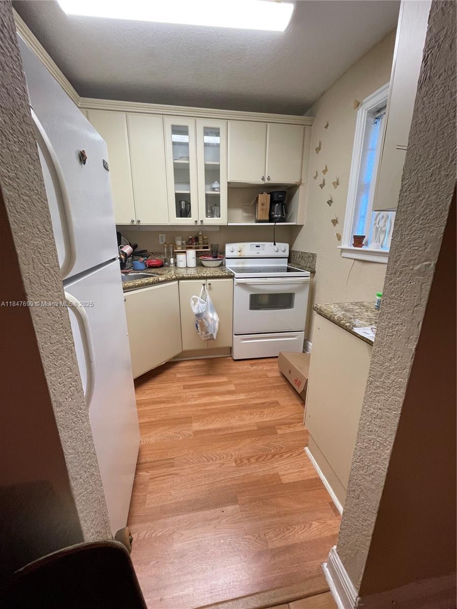 VILLAGE HOMES & CONDOS AT - Residential