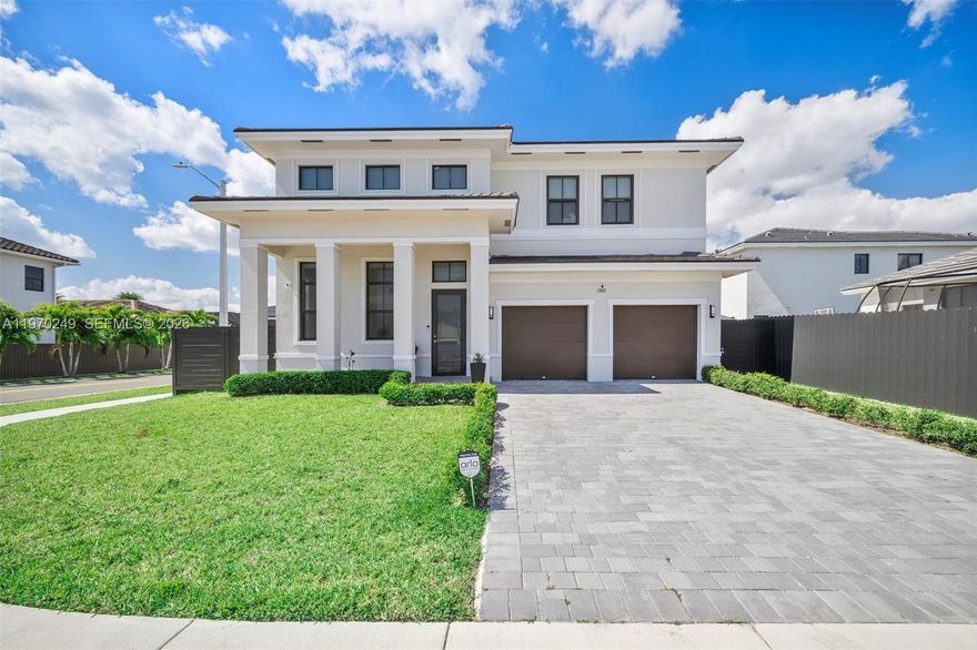 An exceptional new residence in a highly sought-after neighborhood, this stunning home blends modern sophistication with thoughtful design. Showcasing an open-concept layout with soaring ceilings and expansive impact windows, the interiors are flooded with natural light, creating an airy and inviting atmosphere throughout.

Offering 5 spacious bedrooms and 4 beautifully appointed bathrooms, this home delivers both comfort and refined elegance. The gourmet kitchen features granite countertops, premium stainless steel appliances, and flows seamlessly into the expansive living and dining areas—perfect for hosting and everyday living. A private guest suite with a full bath on the main level adds flexibility for visitors or multigenerational living.

Upstairs, the luxurious primary suite serves as a private retreat, complete with dual walk-in closets and a spa-inspired bath designed for relaxation.

Set on a fenced-in corner lot, the outdoor space is where this home truly stands apart—offering enhanced privacy and ample room to design the backyard oasis of your dreams. With plenty of space for a pool and a custom outdoor entertainment experience, the patio and expansive yard are perfectly positioned for elevated Florida living.