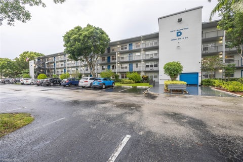 Photo of 13450 SW 3rd St #408D, Pembroke Pines, FL 33027 (MLS # A12062251)