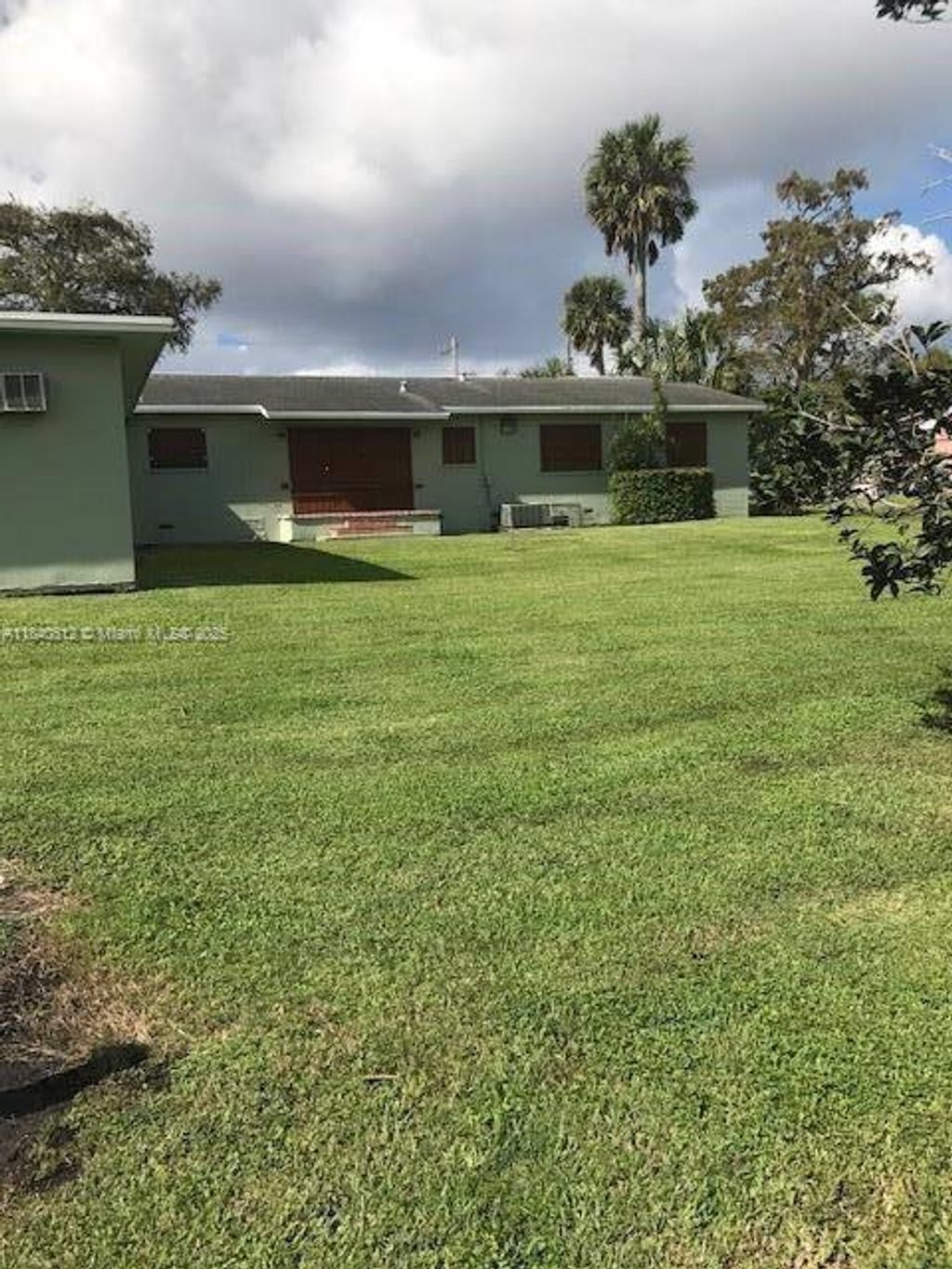 Photo of 1376 E Main St, Pahokee, FL 33476 (MLS # A11840812)