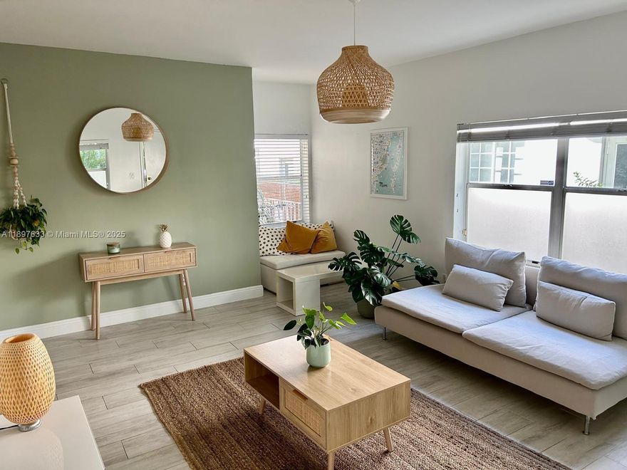 Discover this beautiful, extra-spacious 1-bedroom condo in the heart of South Beach—just a short walk from Lincoln Road, SoFi, and the beach. This inviting, well-maintained unit offers comfort and value, ideal as a full-time residence or investment. Occupying the entire front of the building’s first floor, it's filled with natural light from windows on three sides. Features include updated flooring, modern kitchen, refreshed bathroom, separate living/dining areas, two spacious closets, and in-unit washer/dryer. Private porch overlooks a lush courtyard with greenery, tilework, and seating. Structural and electrical special assessment will be fully paid by seller—no upcoming assessments. Tenant in place until Aug 2026 (flexible from Feb), turnkey investment. Don’t miss this South Beach gem!