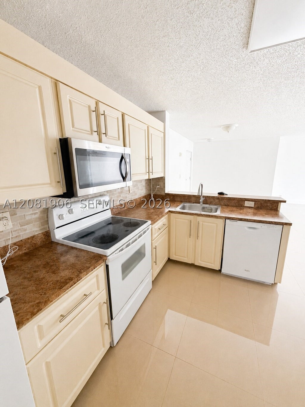 Photo of 10131 W Sunrise Blvd #204, Plantation, FL 33322 (MLS # A12081906)