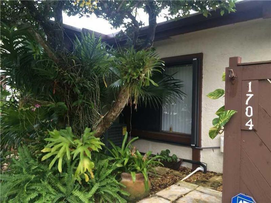 This remodeled 2 bedroom 2 bath villa is completed upgraded top to bottom. Top of the line kitchen, cute dinette with cabinet storage. REAL wood floors, french doors, walk-in closet, california closets. Updated bathrooms, vaulted ceilings. Full size washe r and dryer. Over 400 sq. ft of lovely patio and garden ideal for entertaining or just relaxing after a long day of work. Walking distance from Motorola, Plantation Tech Park, restaurants and shopping. For showing please use show assist.
