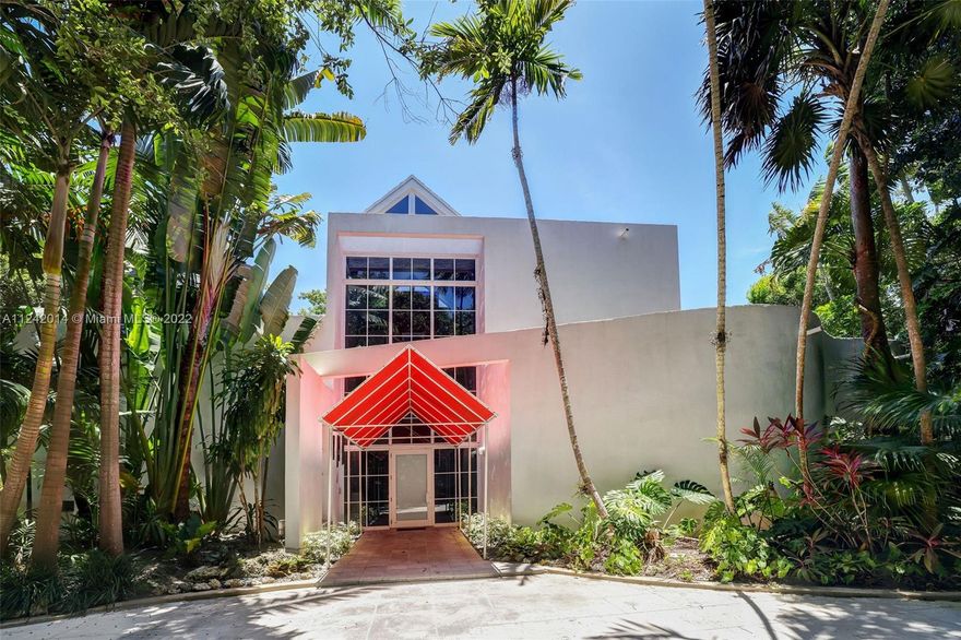 A contemporary modern masterpiece awaits in a perfect setting in the majestic Hammock Lakes guard gated community. This rare, lush property of almost an acre, has many remarkable native hammock trees & rock formations. The home is spectacular with a curved sensibility, volume ceilings, a modern sprawling kitchen, and an expansive living room with floor to ceiling windows looking out to serene views. See floor plan for multi-level layout w/room for an elevator.  Two bedrooms are on the bottom floor, including a housekeeper room. Upstairs are 3 additional spacious suites plus bonus loft home office, including a private master suite w/ balcony. This well-maintained home has a gas generator. Once featured in South Florida magazine and on Miami Vice TV series, the property is simply delightful.