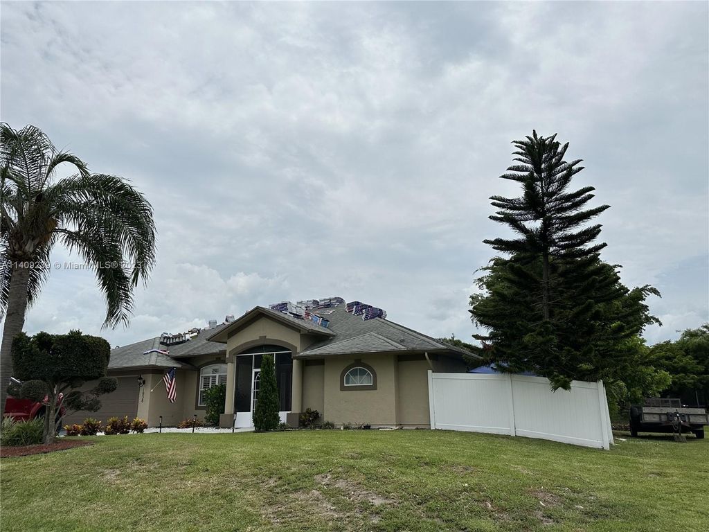 Photo of 1038 SW College Park Rd, Port Saint Lucie, FL 34953 (MLS # A11409239)