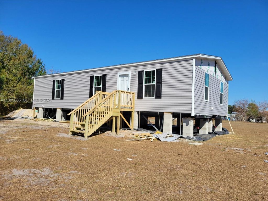 Photo of 357 Horse Club, Clewiston, FL 33440 (MLS # A11889886)