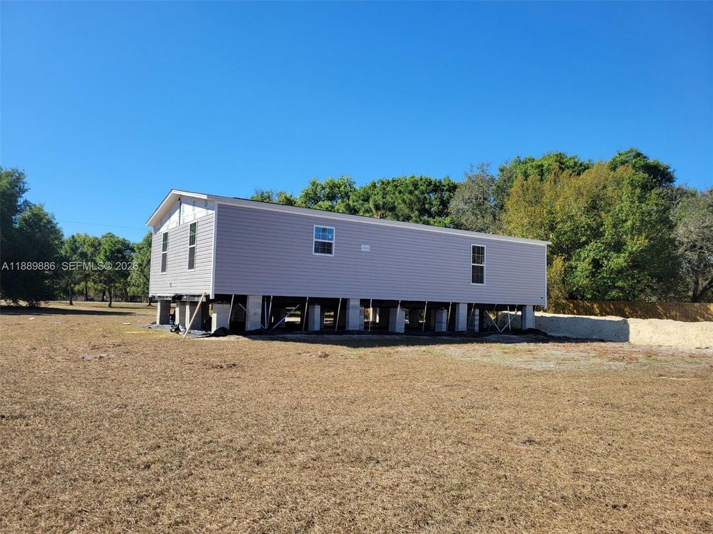 Photo of 357 Horse Club, Clewiston, FL 33440 (MLS # A11889886)