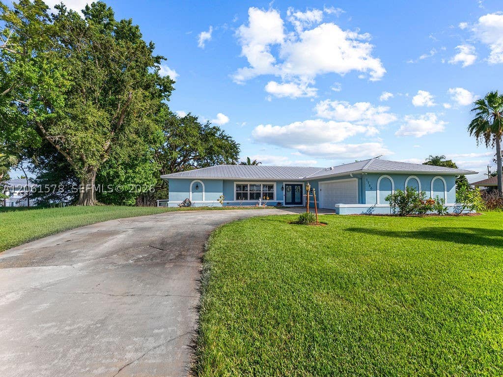 Photo of 1786 SE Westmoreland Blvd, Port St Lucie, FL 34952 (MLS # A12061578)