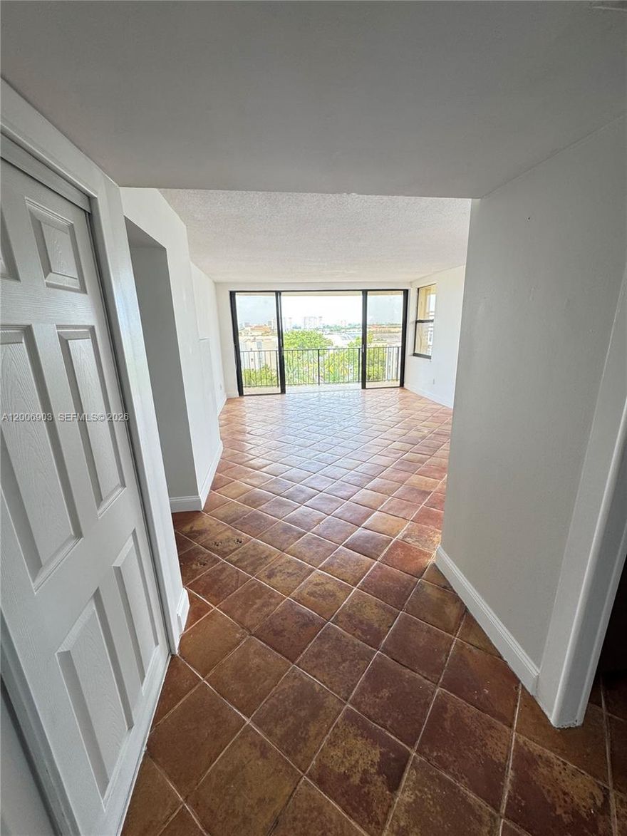 Bright and spacious corner unit-South East Views in Greenwich, North Miami with nearly 1,300 SF of living space and a huge wraparound balcony. Tons of natural light, new A/C, and TWO deeded parking spaces (1 covered + 1 uncovered) — a rare find.

No rental restrictions make this an easy choice for investors or owner-occupants. Unit is currently rented, and tenant is willing to stay for immediate income or leave with proper notice.

Great walkable location near Publix, shops, cafes, LA Fitness, major highways, beaches, Aventura, and Sunny Isles Beach.

Building amenities include pool, gym, and common areas. Great opportunity with flexibility and income potential.