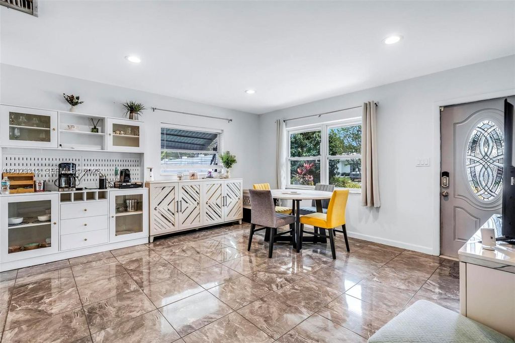 Photo of 7211 NW 76th St, Tamarac, FL 33321 (MLS # A12029312)