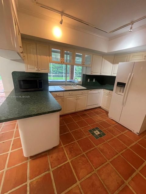 Photo of 7185 SW 101st St, Pinecrest, FL 33156 (MLS # A11884545)