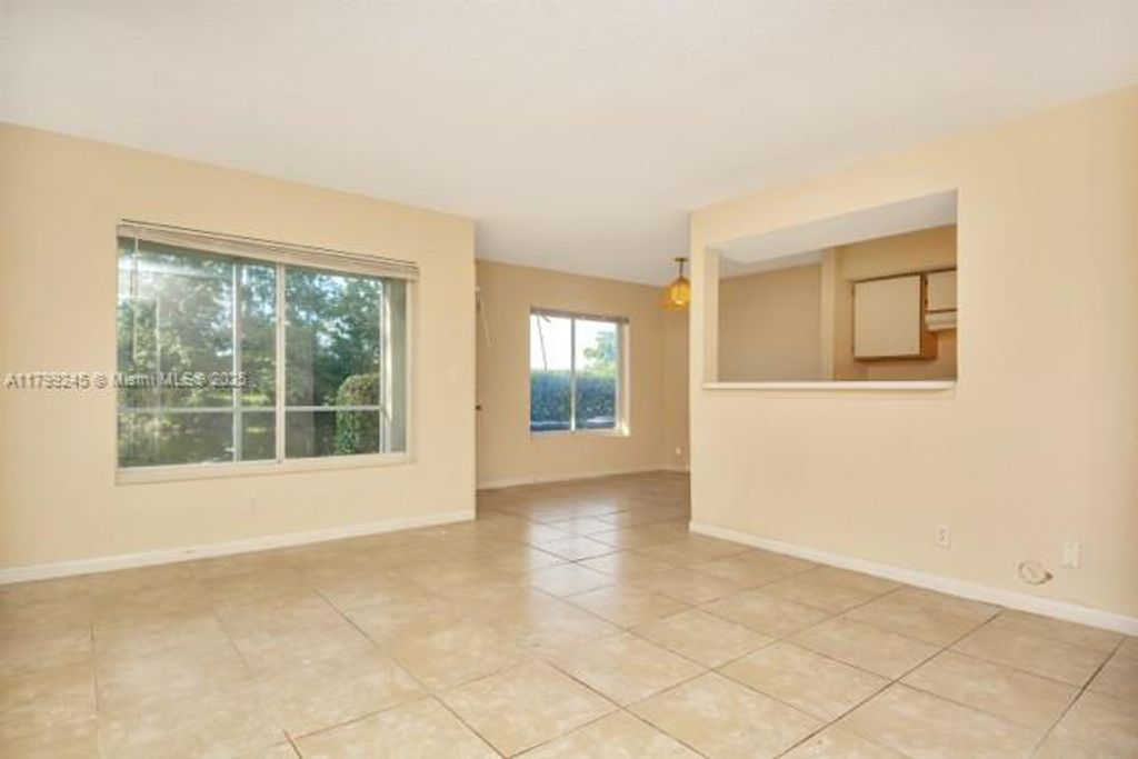 Photo of 815 W Boynton Beach Blvd #5-103, Boynton Beach, FL 33426 (MLS # A11799245)