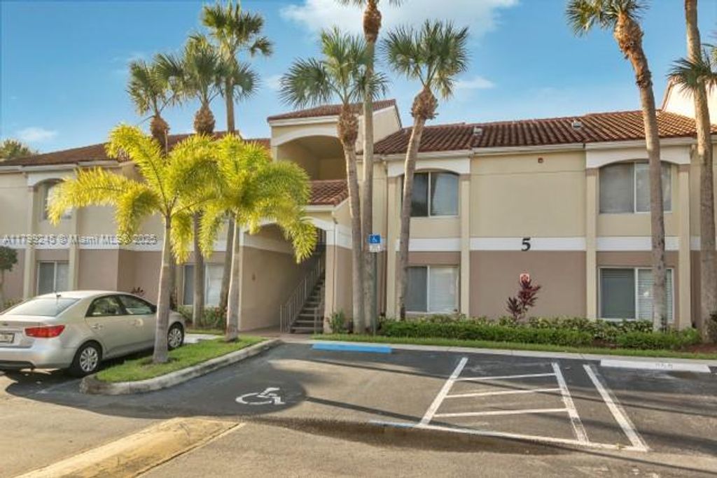 Photo of 815 W Boynton Beach Blvd #5-103, Boynton Beach, FL 33426 (MLS # A11799245)