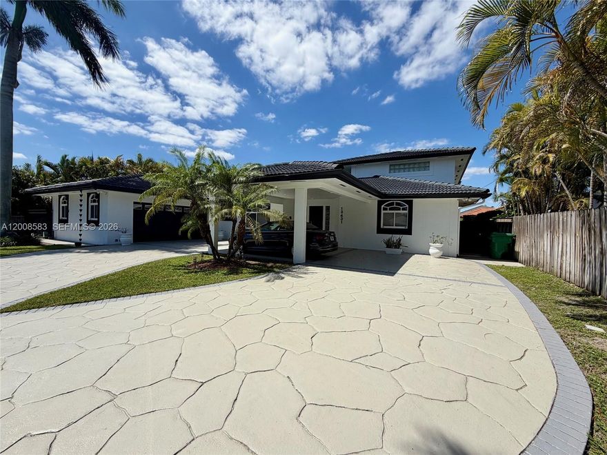 Here is your great opportunity to buy this incredible home and turn it into your dream home. This impressive residence offers a rare combination of space, functionality, and entertainment-focused design in one of South Florida’s desirable areas.
Set on a generous 13,997 sq ft lot, the home features 4,368 sq ft of living space with 5 bedrooms and 4 bathrooms, thoughtfully designed to provide both privacy and open living areas. A standout feature of the property is its exceptional parking and storage capacity, including a 2 car garage in the front of the home and an additional detached 2 car garage in the rear, connected with through doors along the left side of the house, for a total of 4 garage spaces. Inside, the home offers multiple distinct living and entertaining spaces, including a family room, a formal dining room, and a separate bar and dance floor room designed for hosting and entertainment. The layout includes a private master suite located on the second floor, creating a quiet and separated retreat from the main living areas. Outside, the property provides plenty of space to build a custom pool and pergola, offering excellent potential to create a resort style backyard. This home presents a rare opportunity in Miami with size, flexibility, and strong entertainment features throughout.  Call today as this will not last.