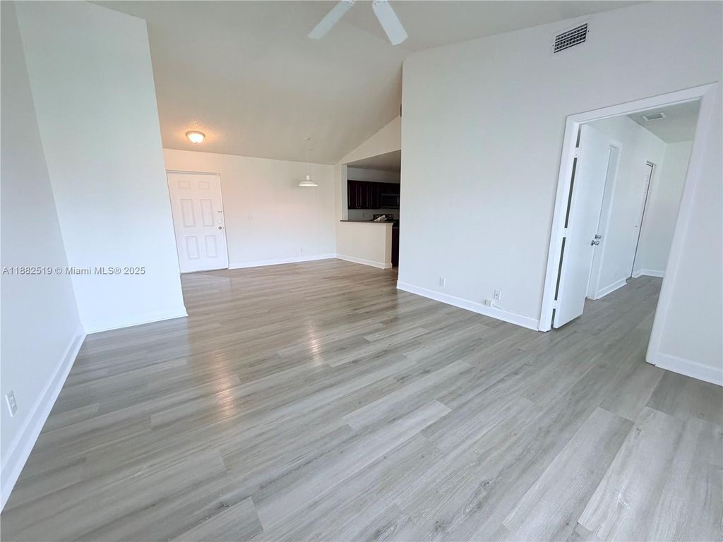 Photo of 5761 Riverside Dr #303B4, Coral Springs, FL 33067 (MLS # A11882519)