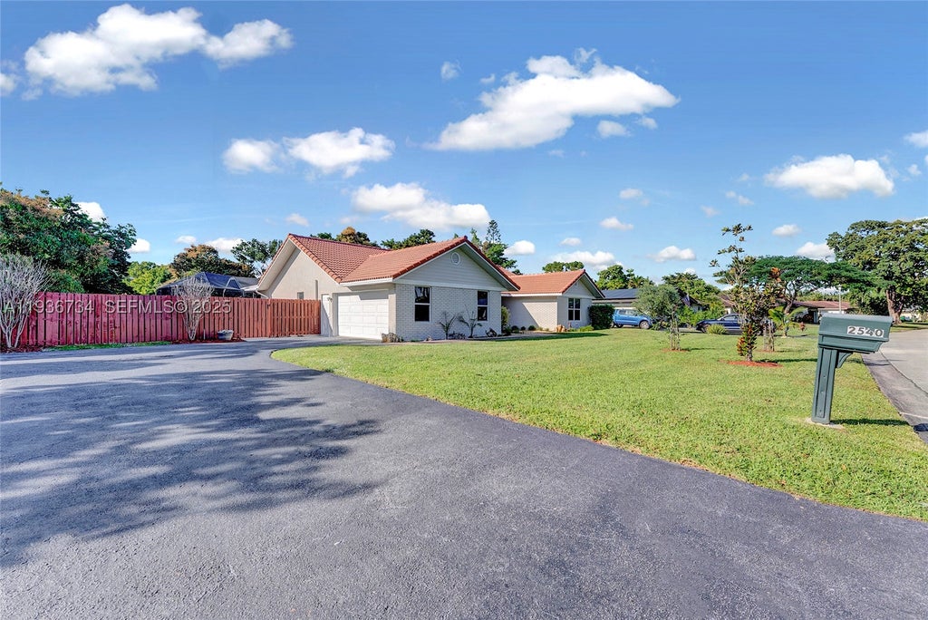 Photo of 2540 NW 115th Dr, Coral Springs, FL 33065 (MLS # A11936734)
