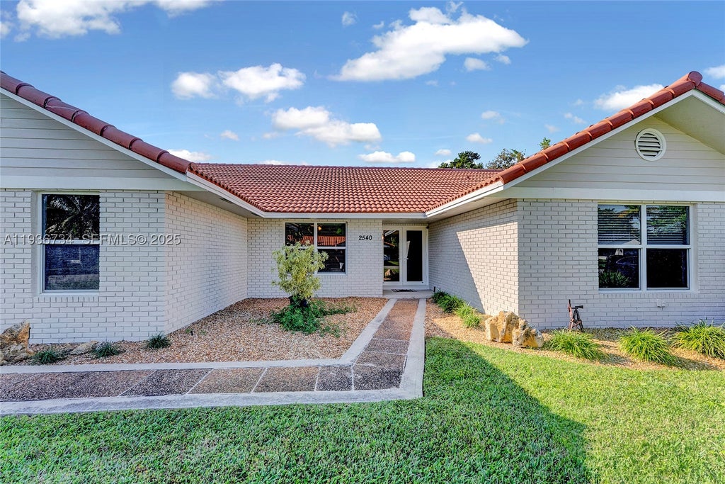Photo of 2540 NW 115th Dr, Coral Springs, FL 33065 (MLS # A11936734)