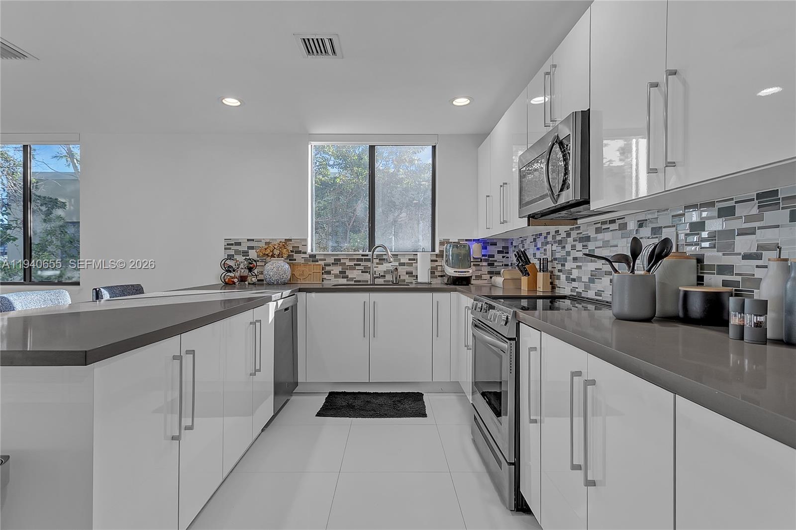 AMALFI IN THE GABLES COND - Residential