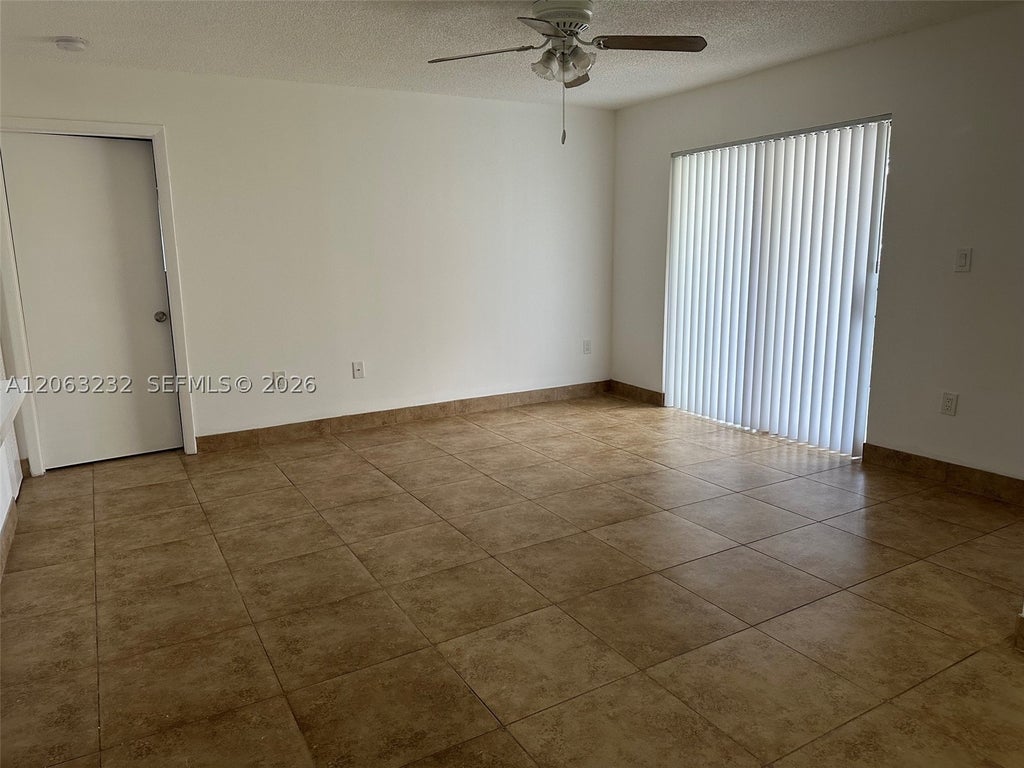 Photo of 9491 S Palm Cir S #203, Pembroke Pines, FL 33025 (MLS # A12063232)