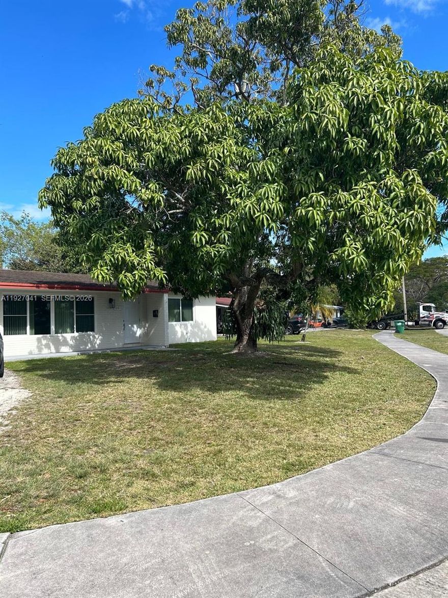 This charming 3-bedroom, 1-bath corner lot home is nestled in the beautiful and established Palmetto Estates neighborhood, offering comfort, security, and a true sense of home. Featuring hurricane-impact windows and sliding door, a well-maintained roof, this property provides peace of mind year-round. The home is surrounded by mature fruit trees, including mango, avocado, and mamey, creating a lush and inviting outdoor setting.   The backyard is perfect for relaxing or entertaining, with a covered patio, a solid concrete storage shed, and a fenced kennel. This expansive backyard is ideal for adding a pool and outdoor entertainment as well. Conveniently located just 10 minutes from The Falls Mall and the Miami Zoo, it blends tranquility with easy access to shopping and entertainment.  Owned and lovingly cared for by the sellers for over 30 years, this home is full of warmth and history.