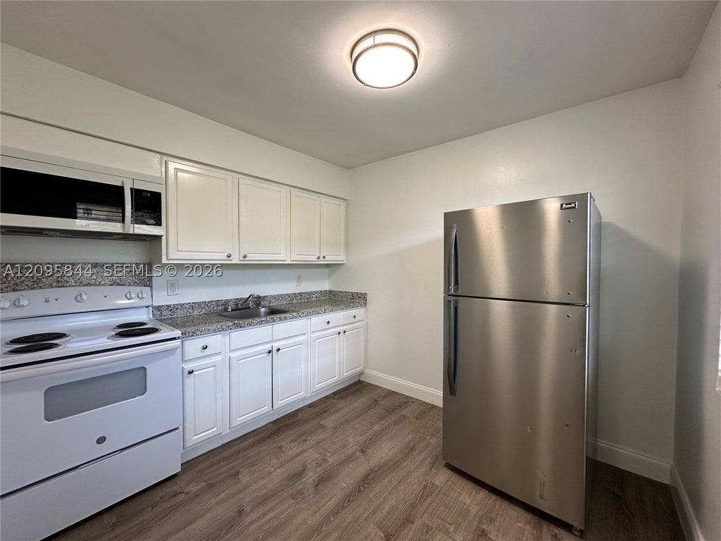 Photo of 2309 Madison St #8, Hollywood, FL 33020 (MLS # A12095844)
