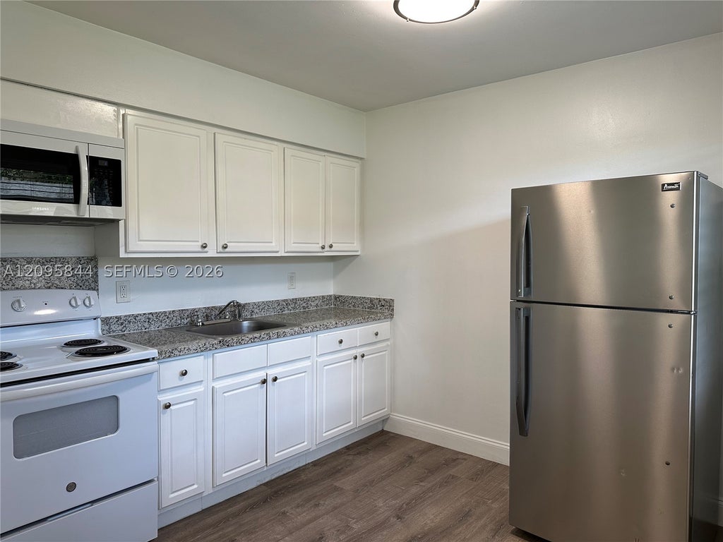 Photo of 2309 Madison St #8, Hollywood, FL 33020 (MLS # A12095844)