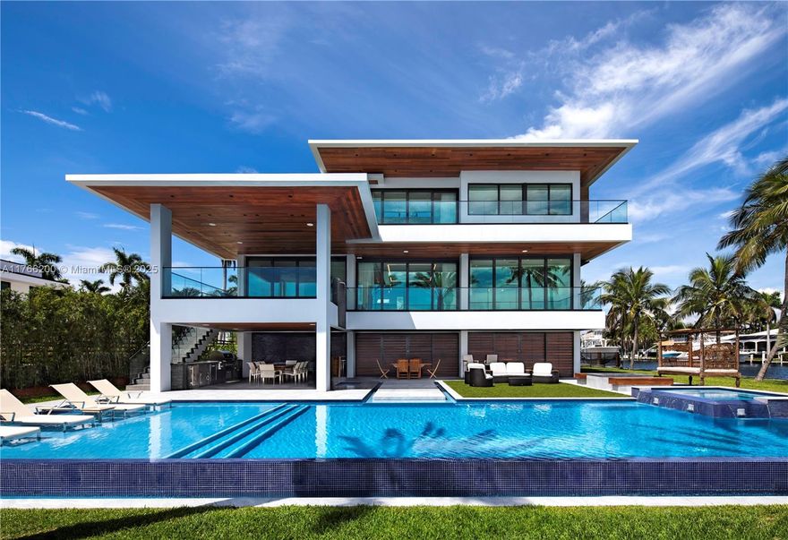 This is the most prestigious estate in all of Gables by the Sea. Built in 2018 and meticulously designed by Calil Architects, this extraordinary residence is a boater's paradise, featuring over 300 feet of seawall, two docks, and a boat lift. With ample space to accommodate both a 100-foot yacht and a 40-foot tender, this property offers the ultimate in luxury waterfront living. Nestled on a coveted corner lot, the home boasts breathtaking bay views from every room. Comprising seven bedrooms—five of which are on the second floor, each with its own private bathroom, walk-in closet, and covered terrace—this home provides unparalleled comfort and privacy. The pool, backyard, and BBQ area create an oasis-like retreat, perfect for both relaxation and sophisticated outdoor entertaining.
