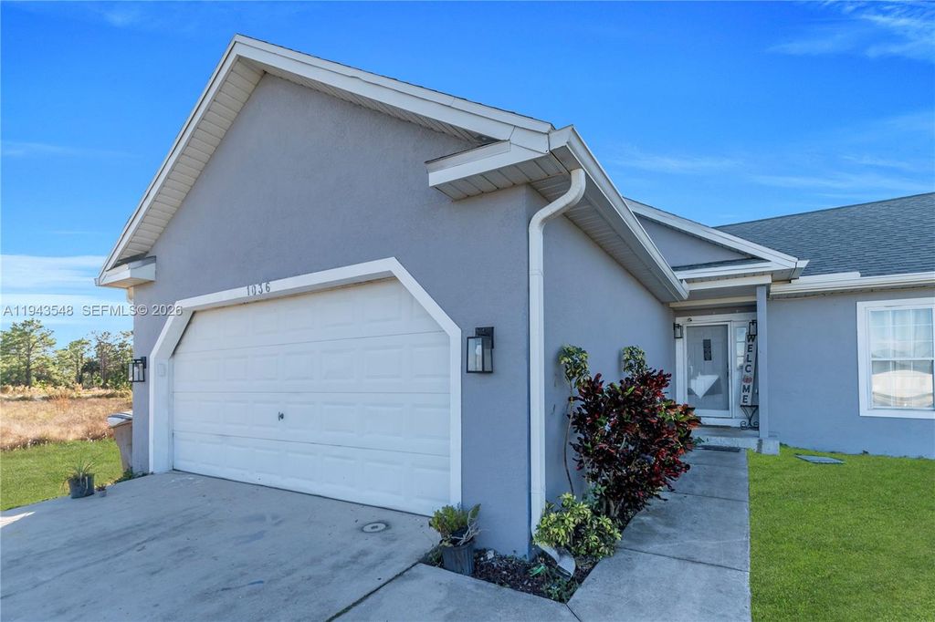 Photo of 1036 Gunby Ave, Lehigh Acres, FL 33974 (MLS # A11943548)