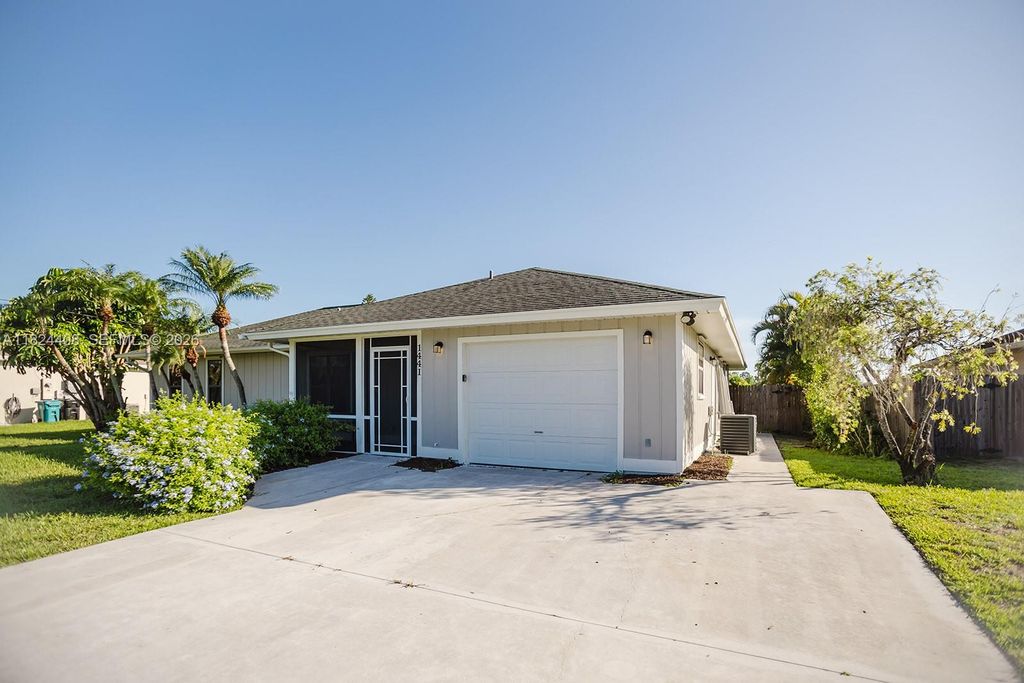 Photo of 1441 SW Algardi Ln, Port St Lucie, FL 34953 (MLS # A11824408)