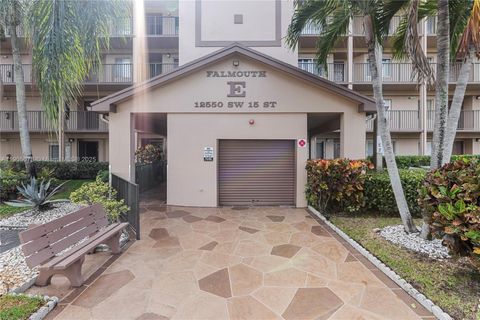 Photo of 12550 SW 15th St #411E, Pembroke Pines, FL 33027 (MLS # A11905078)