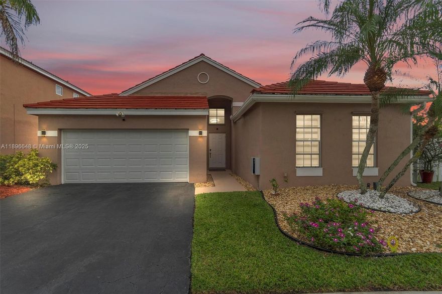 Beautiful updated 3 bedrooms/2 bathrooms corner home.  One story home located inside Bermuda Springs, a small gated community in Weston. This home offers an inviting layout with natural light and modern finishes. The kitchen has been recently upgraded with modern cabinetry and quartz countertops. Big fenced yard with room for pool and perfect for weekend barbecues, relaxing afternoons or entertaining friends and family. Home has electric car charging station. Excellent location, close to Weston Town Center where you will find restaurants, shops, coffee spots and markets. Families love being within walking distance of Tequesta Trace Middle School and zoned for top rated A schools.
Don’t miss your chance to own this move-in-ready gem in one of South Florida’s most sought-after communities!.