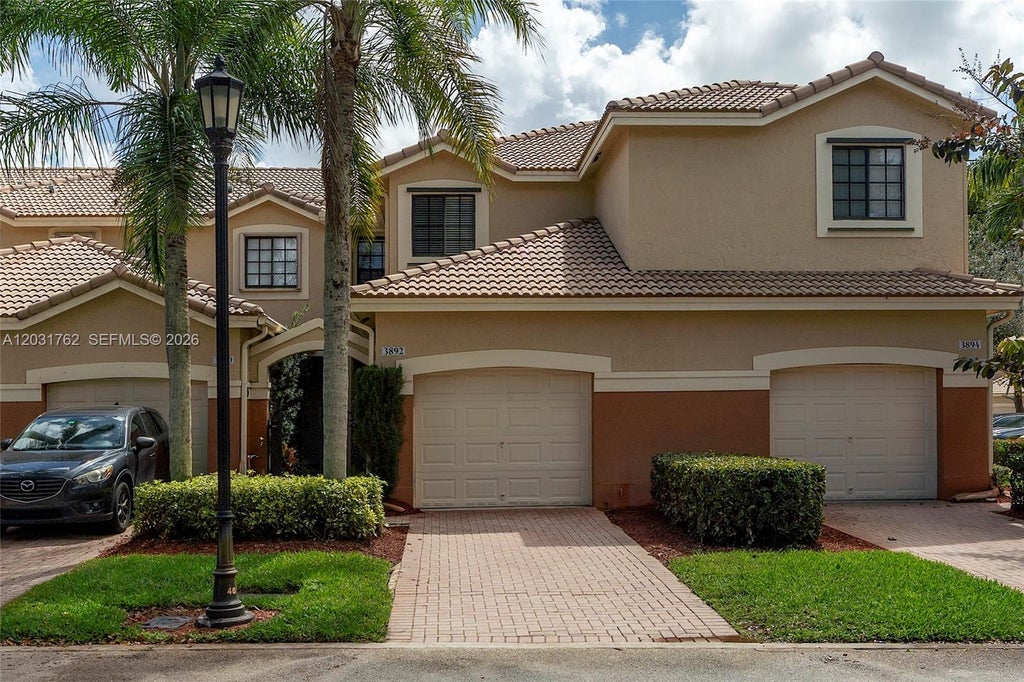 Photo of 3892 Tree Top Dr, Weston, FL 33332 (MLS # A12031762)