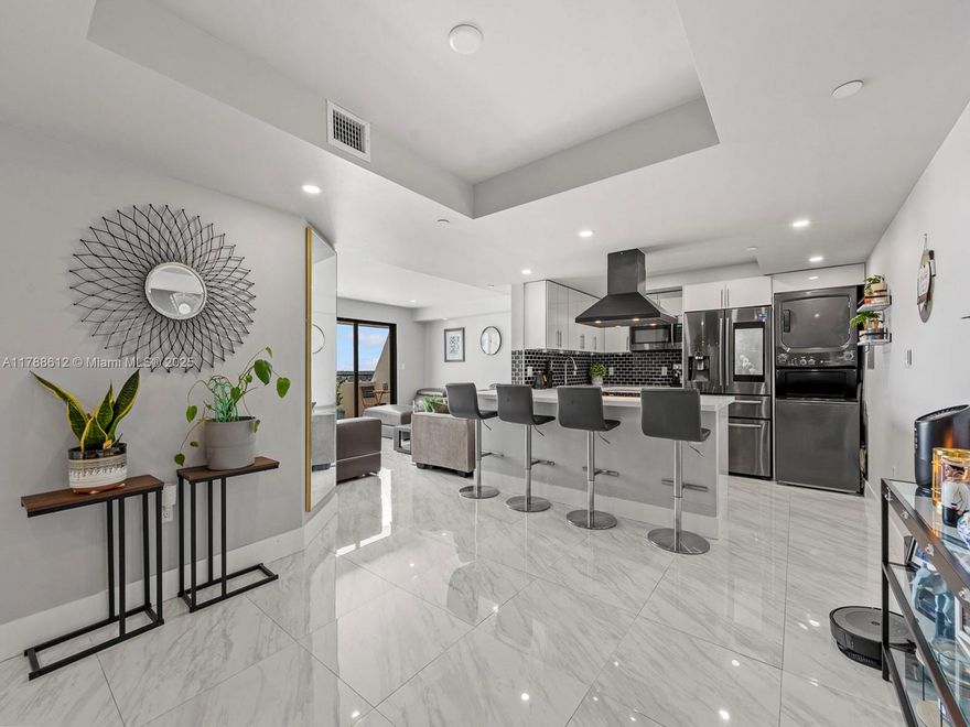 Step into Penthouse 1601 of Gables Park Tower Condo for luxurious Coral Gables living. This fully renovated condo features impact windows, impact slider doors that fully open to either side, porcelain tiles, GE washer/dryer, & custom built-out closets. Fall in love w/ the modern kitchen boasting quartz countertops & dark stainless steel Samsung appliances for a sleek finish. Spacious & bright, the primary bedroom offers a walk-in closet & private ensuite bathroom. Enjoy the sunrise from the floor-to-ceiling windows in both bedrooms. Step onto the open balcony & relish in an expansive city view overlooking the pool. 2 parking spaces near elevator & a small storage unit + water included. HOA fee is $1,080.56/mo + sp. assessment is $135.83/mo. Seller will pay off special assessment at closing