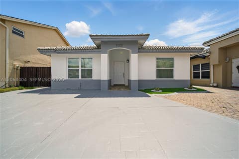 Photo of 5202 NW 187th St, Miami Gardens, FL 33055 (MLS # A12068404)
