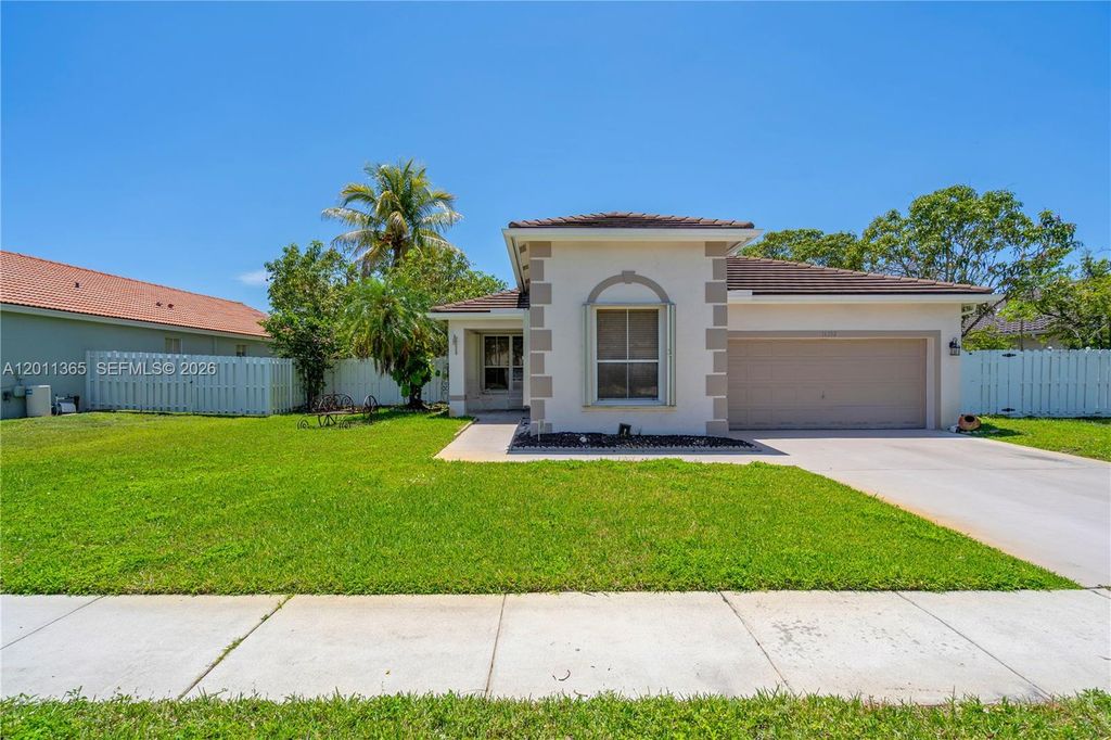 Photo of 16332 SW 10th St, Pembroke Pines, FL 33027 (MLS # A12011365)
