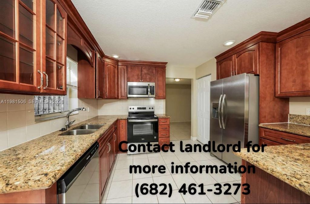 Photo of 1025 Cape Cod Ter, Green Acres, FL 33413 (MLS # A11981506)